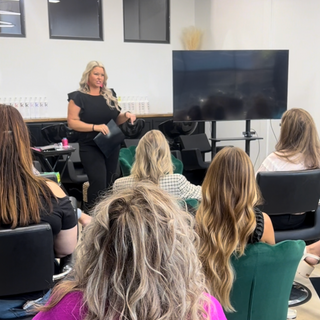 Woman presenting to an audience 